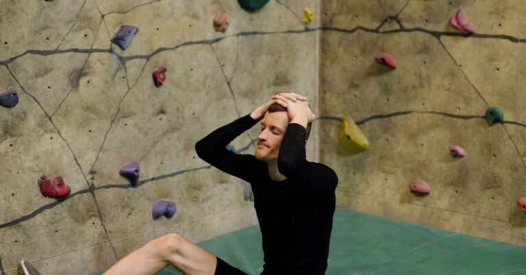 Mistakes - Man Sitting by Climbing Wall