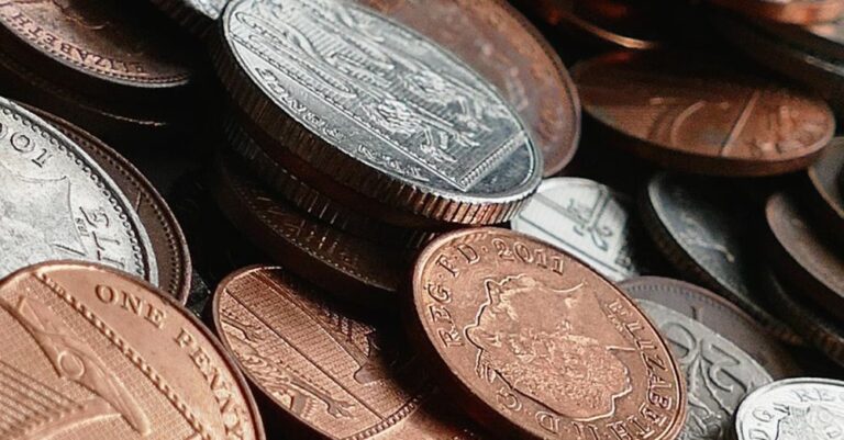 Funding - Silver and Brown Round Coins