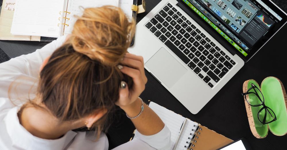 Stress Management - Woman Sitting in Front of Macbook