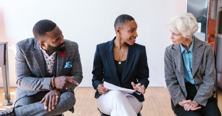 Investors - People Talking while Sitting