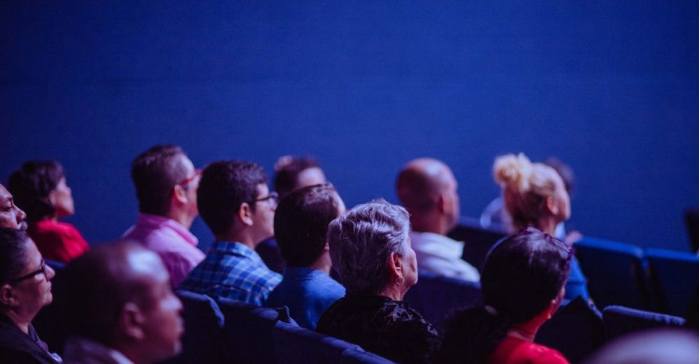 Audience - People Sitting on Gang Chairs